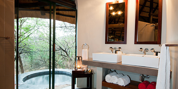 Private Luxury Chalet bathroom and plunge pool at Leopard Mountain Game Lodge in the Manyoni Private Game Reserve