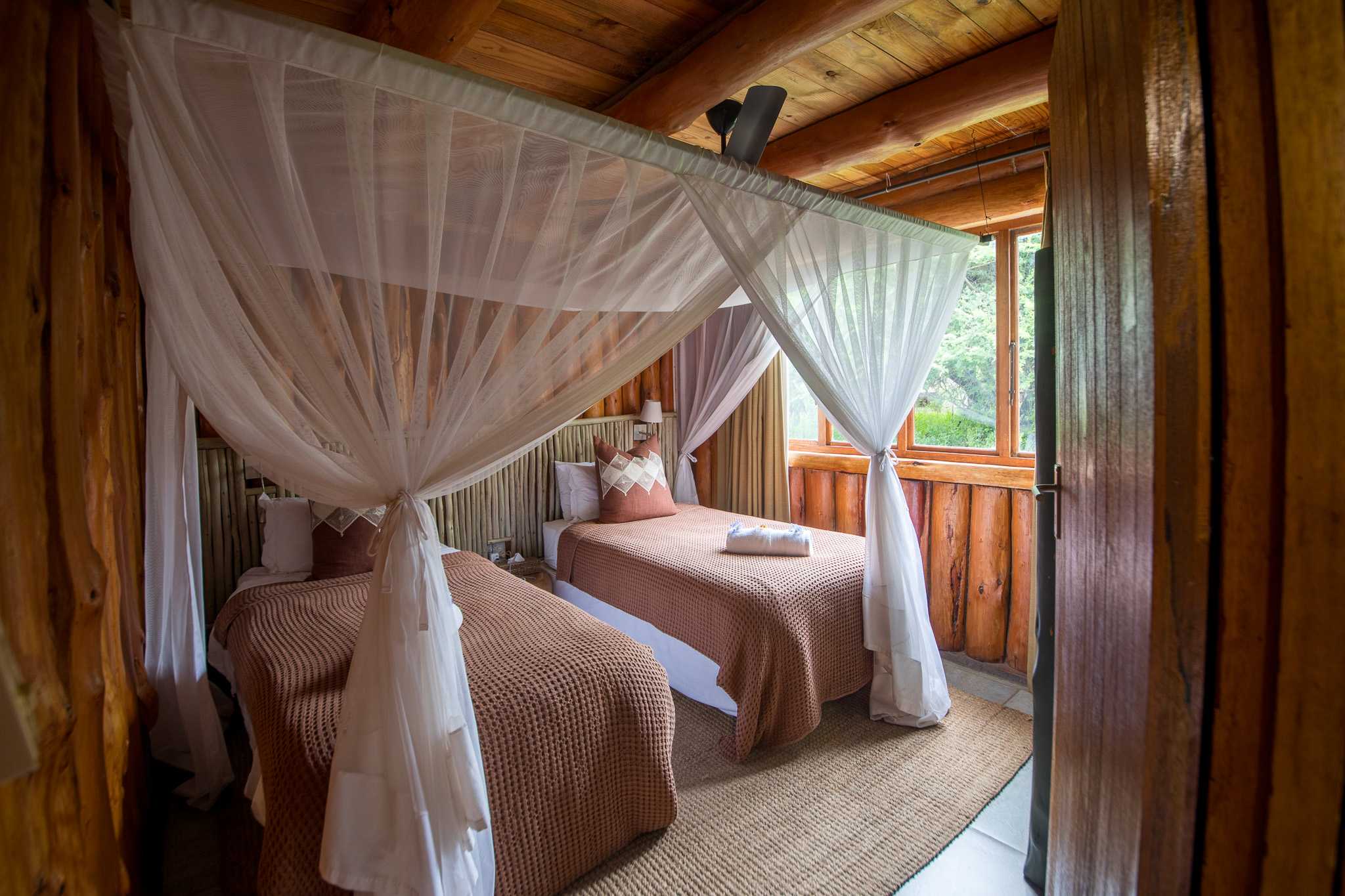 Family Chalet Twin Bedroom at Rhino River Lodge in the Manyoni Private Game Reserve (Zululand Rhino Reserve), KwaZulu-Natal