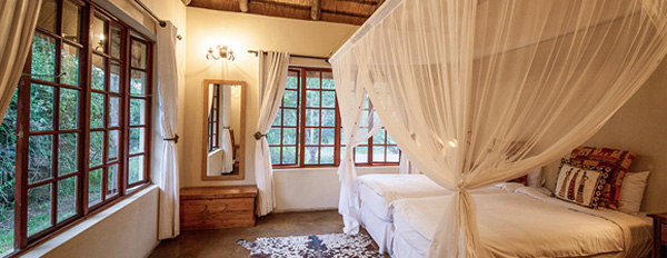 The Cottage, Twin bedroom at Rhino River Lodge in the Big 5 Manyoni Private Game Reserve (previously the Zululand Rhino Reserve), KwaZulu-Natal
