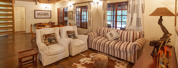 The Cottage, Open plan Lounge at Rhino River Lodge in the Manyoni Private Game Reserve (Zululand Rhino Reserve) located in KwaZulu-Natal